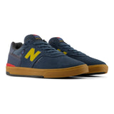 New Balance 306 CON Shadow Blue/Mars Yellow vista tres cuartos
