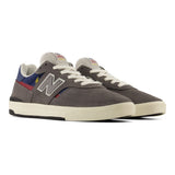 New Balance 306 CYZ Castlerock/NB Navy vista lateral