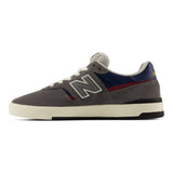 New Balance 306 CYZ Castlerock/NB Navy vista tres cuartos frontal